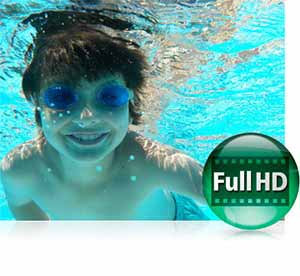 Nikon COOLPIX S33 photo of a boy underwater and the Full HD video icon highlighting video capture